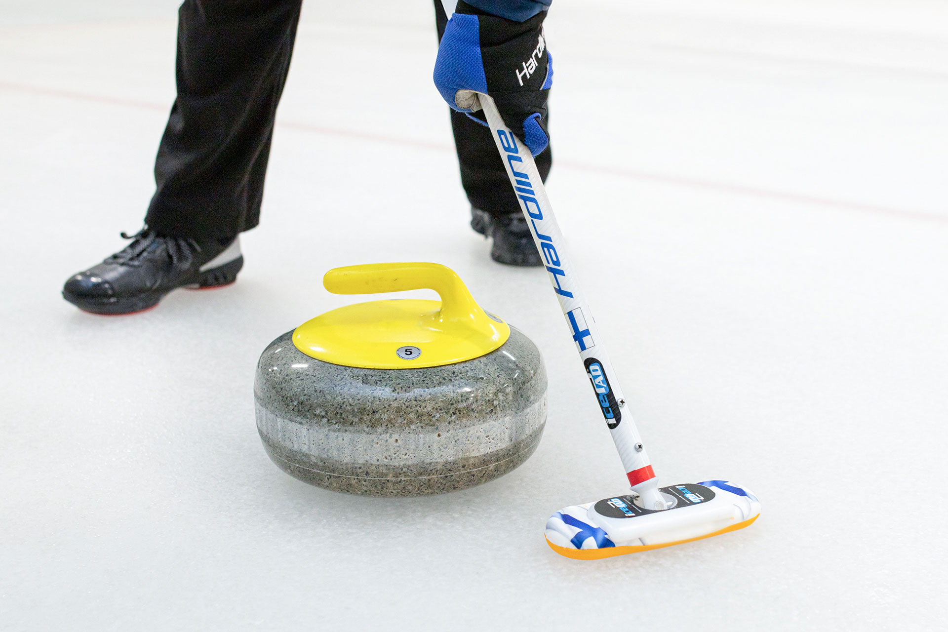 curling-harjaaminen-kivi